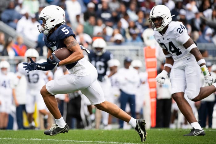 Penn State wide receiver Omari Evans runs with the football.